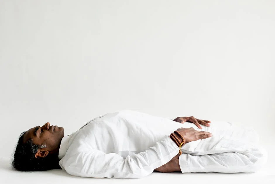 Traditional yogi in a complex meditation posture illustrating the physical difficulty of accessing deep rest compared to NSDR in a float tank.